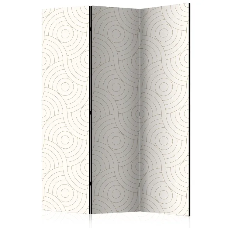 Ruedas (3 partes): formas geométricas sobre fondo en tonos beige