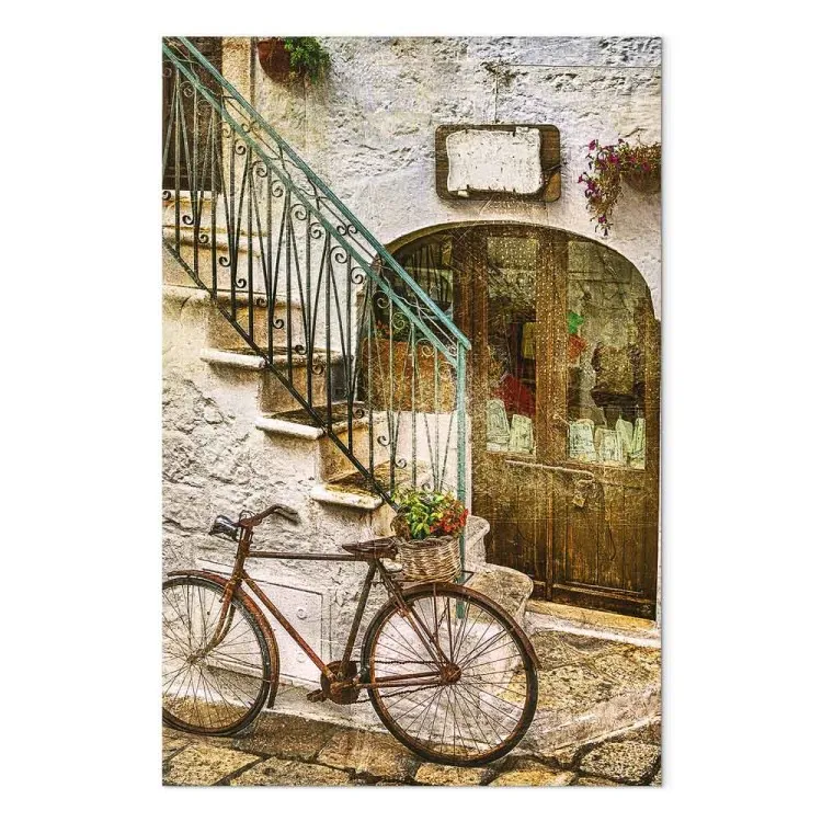 Bicicleta junto a la escalera de piedra - foto de una ciudad italiana
